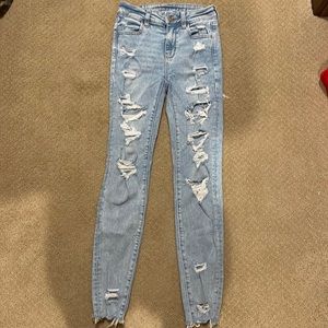 Light blue ripped high rise skinny jean very comfortable regular length